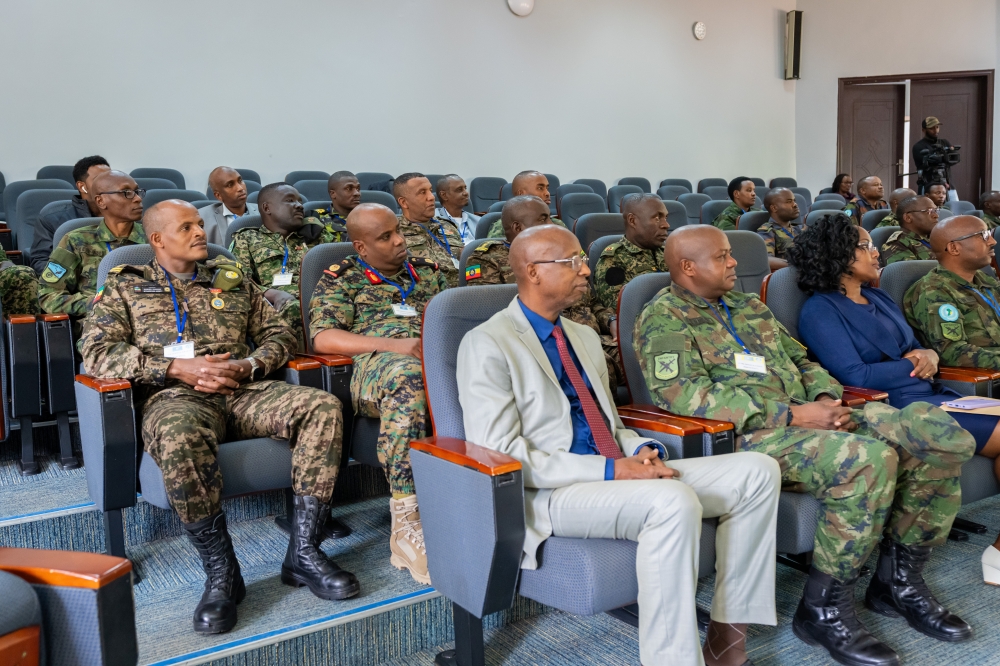 Participants follow Gen Muganga's remarks