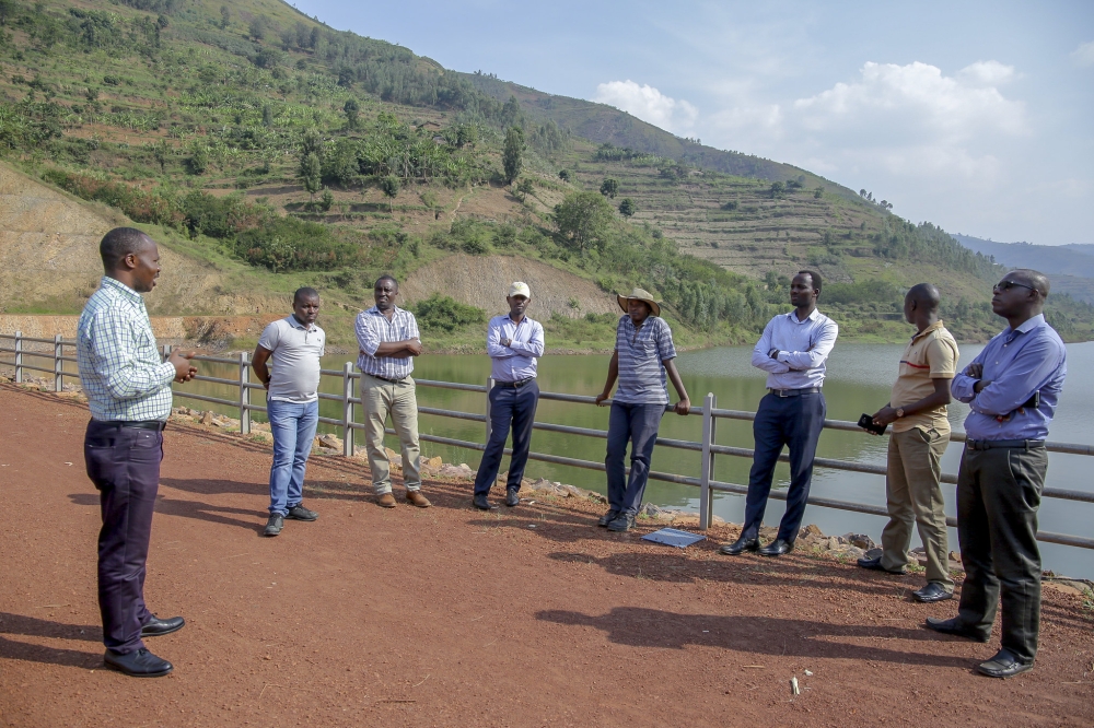 Visitors at Muyanza Dam that was constructed to help farmers in irrigation in Rulindo District on September 10, 2019. Courtesy