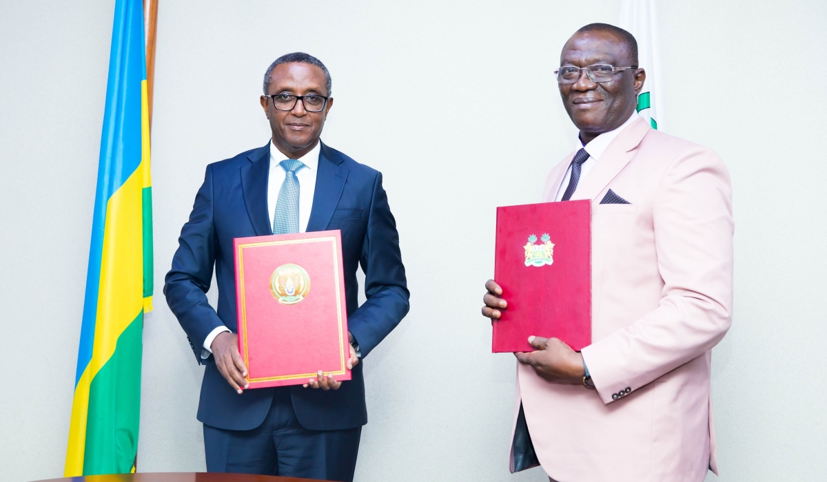 The Minister Interior Dr Vincent Biruta and  Maj Gen (Rtd) David Tamba Ocil Taluva, Minister of Internal Affairs of the Republic of Sierra Leone during the signing agreement in Kigali on Monday, August 26.Courtesy