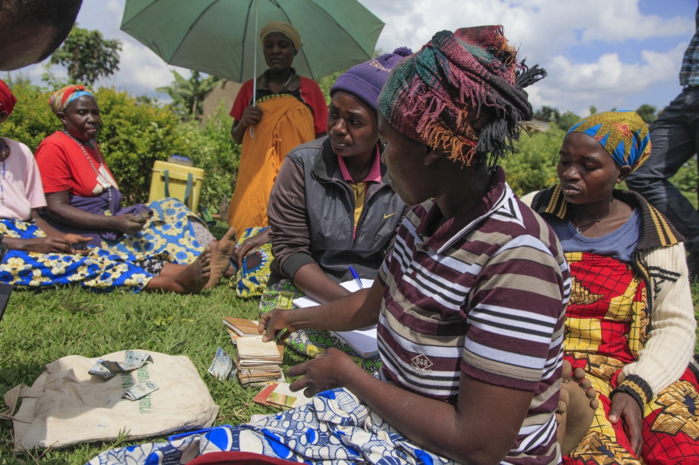 Women collect their contribution in their Ikibina in Muko Sector, Musanze. The new legislation governing tontines – commonly known as ibimina – is expected to deter mismanagement of funds saved by members. Sam