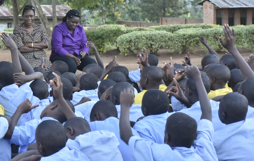 Visitors speak tp children at  Gitagata Rehabilitation Centre in Bugesera. Five children who are undergoing rehabilitation at the centre are set to be released. File