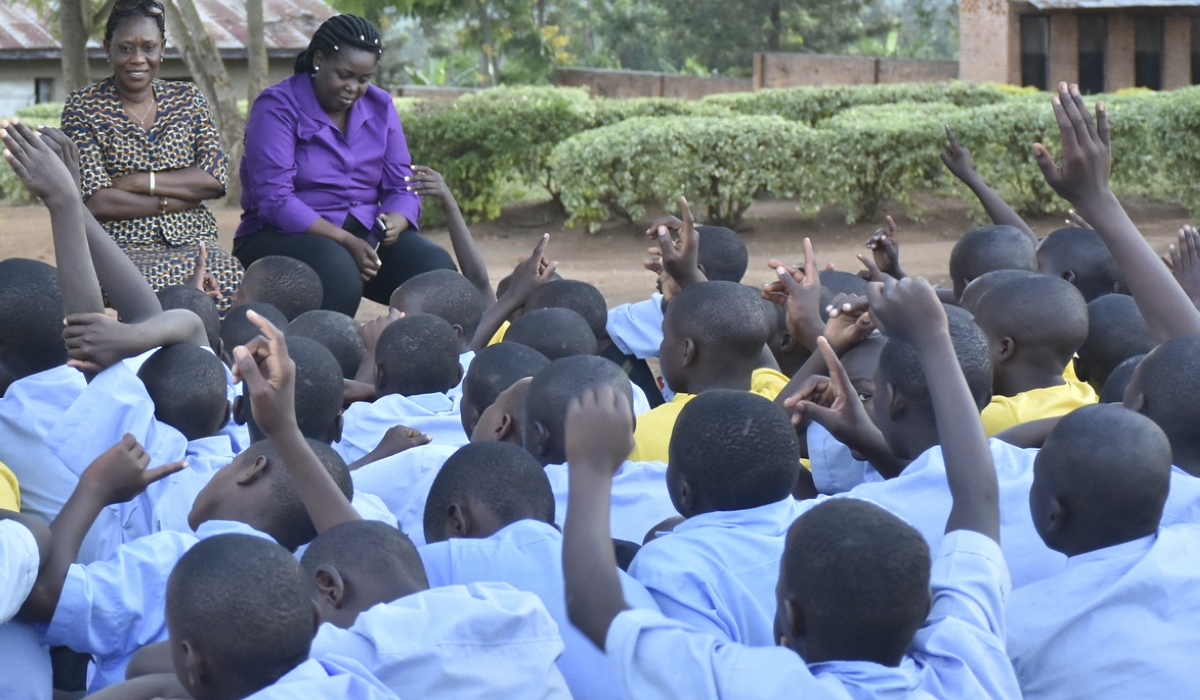 Visitors speak tp children at  Gitagata Rehabilitation Centre in Bugesera. Five children who are undergoing rehabilitation at the centre are set to be released. File