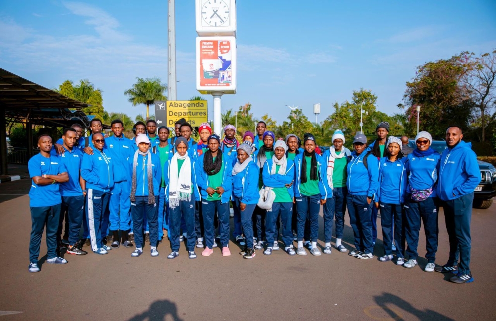 Rwanda’s U18 basketball teams (boys and girls) pose for a group photo during the departure at Kigali International Airport on Friday,  August 30.  