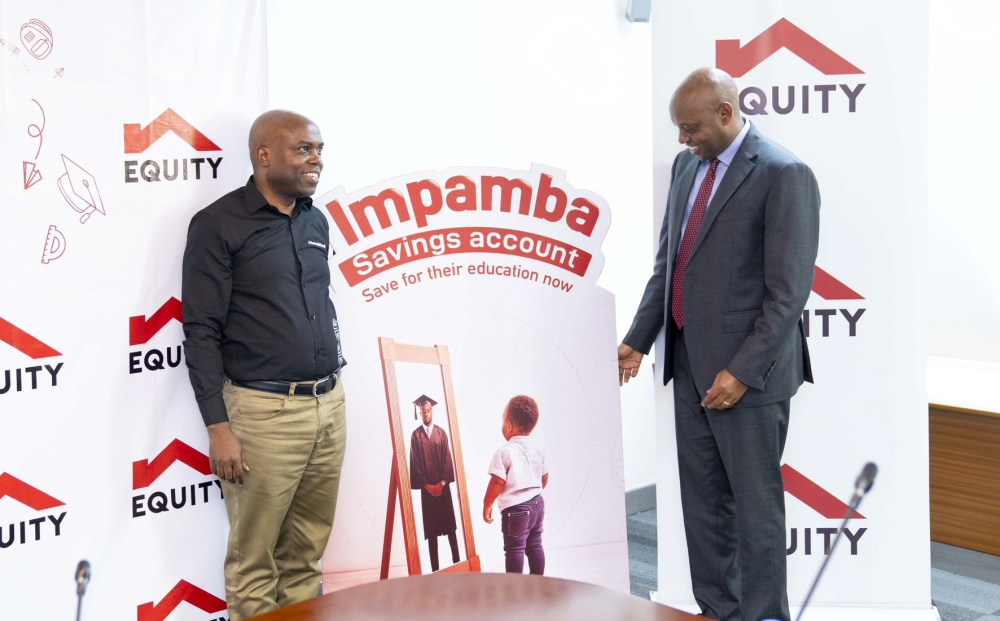 Jean Chrysostome Hodari, Chief Executive Officer of SanlamAllianz Life Insurance Rwanda Plc, andHannington Namara, Managing Director of Equity Bank Rwanda, at the launch event on Friday, August 30.