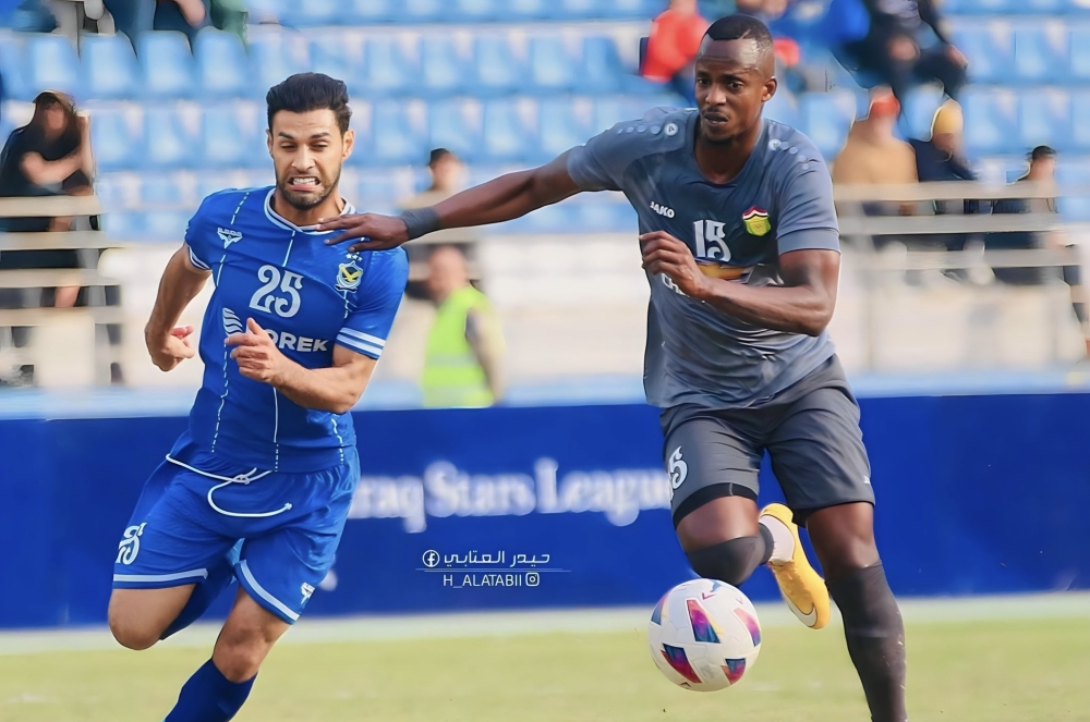 Defender  Faustin Usengimana in action vying for the ball with a player. Courtesy