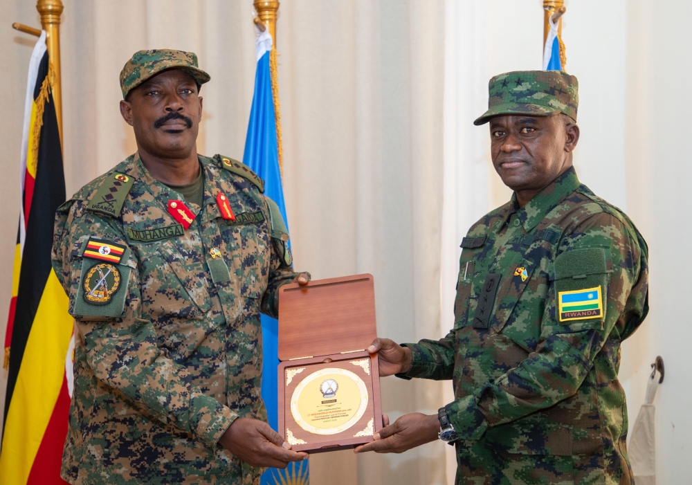 Rwanda Defence Force&#039;s Army Chief of Staff Maj Gen Vincent Nyakarundi, and UPDF Land Forces Commander, Lt Gen Kayanja Muhanga at the meeting in Mbarara. The bilateral meeting aimed at strengthening cross-border cooperation and curbing cross-border crimes between Rwanda and Uganda. Courtesy