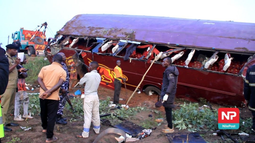 A scene of Sunday&#039;s tragic road accident that involved a Jaguar bus traveling from Kampala to Kigali and killed eight people. Courtesy