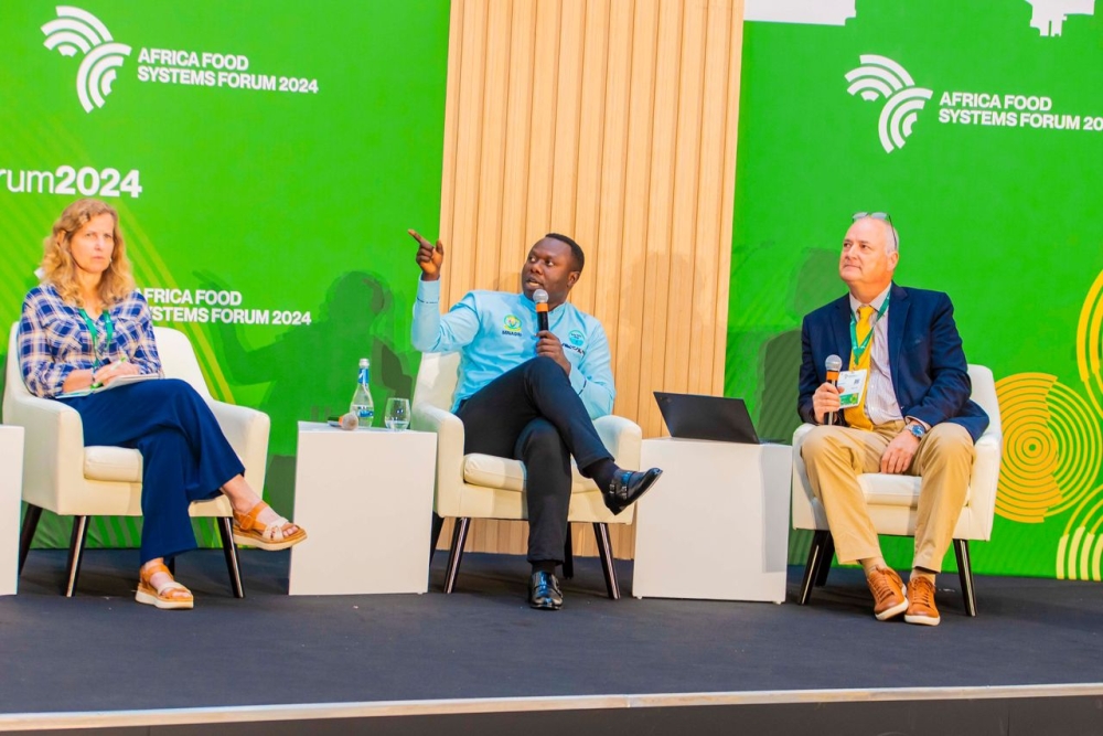 Emmanuel Ndayizigiye, Chief Executive Officer of Yalla Yalla Group (C) speaks on a panel discussion  at Africa Food Systems Forum in Kigali on Monday, September 2. COURTESY