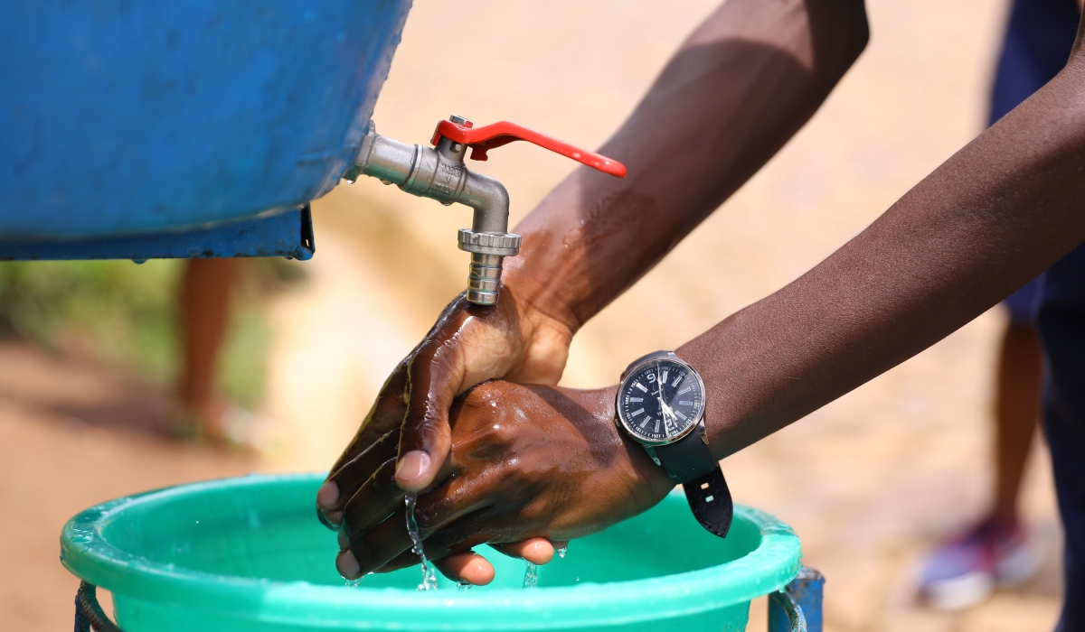 A student washes hands at Groupe Scolaire Rugando in Kimihurura Sector Gasabo District. Sam Ngendahimana