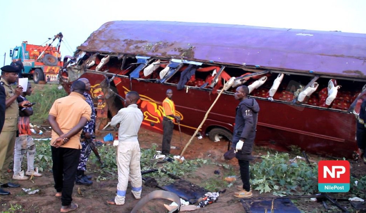 A scene of Sunday&#039;s tragic road accident that involved a Jaguar bus traveling from Kampala to Kigali and killed eight people. Courtesy