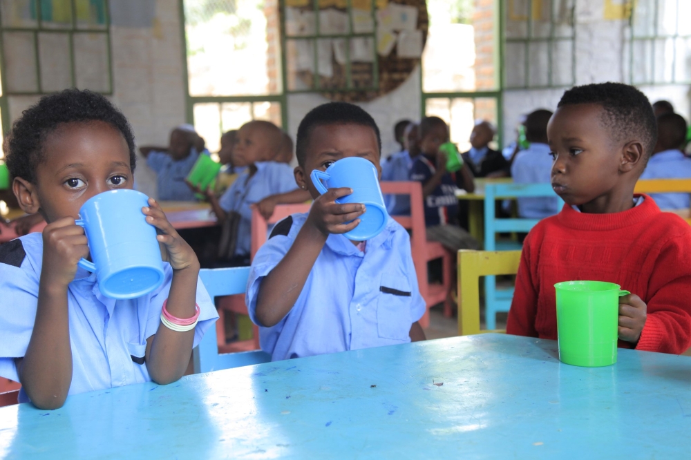 Children take porridge at Mageragere ECD centre in Nyarugenge District. Sam Ngendahimana