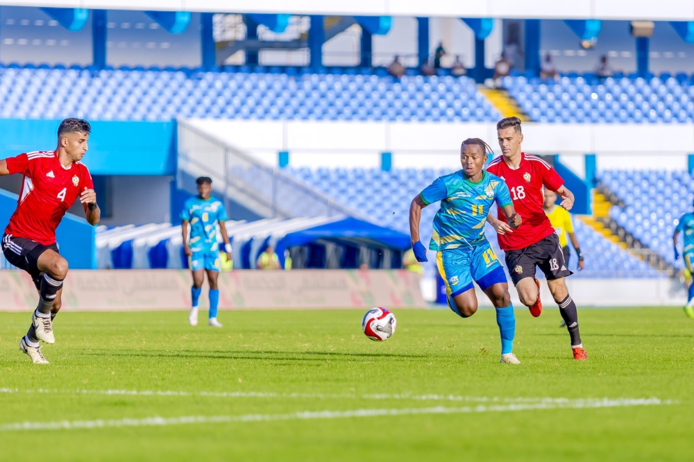 Midfielder Kevin Muhire controls the balll during the game