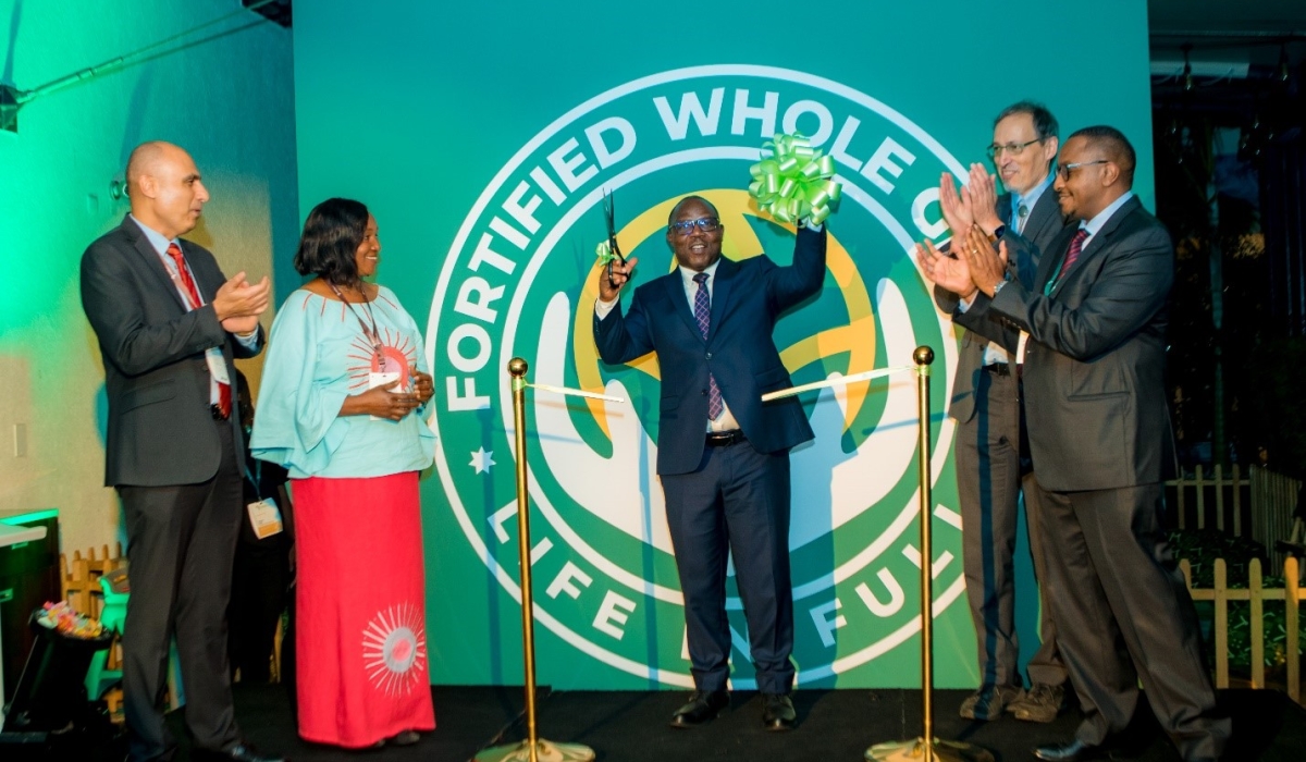 Rwanda&#039;s Minister of Local Government, Jean Claude Musabyimana, officially launches the Fortified Whole Grain Alliance (FWGA) in Kigali, on Tuesday, September 3. With him are David Kamau (FWGA), Roy Steiner, Peiman Milani, and Betty Kibaara of the Rockefeller Foundation. Courtesy photo