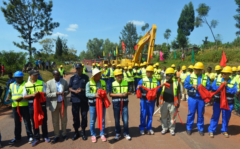 Officials and CRBC staff at the launch of the Kayonza-Rusumo rehabilitation and widening road project in 2016. File