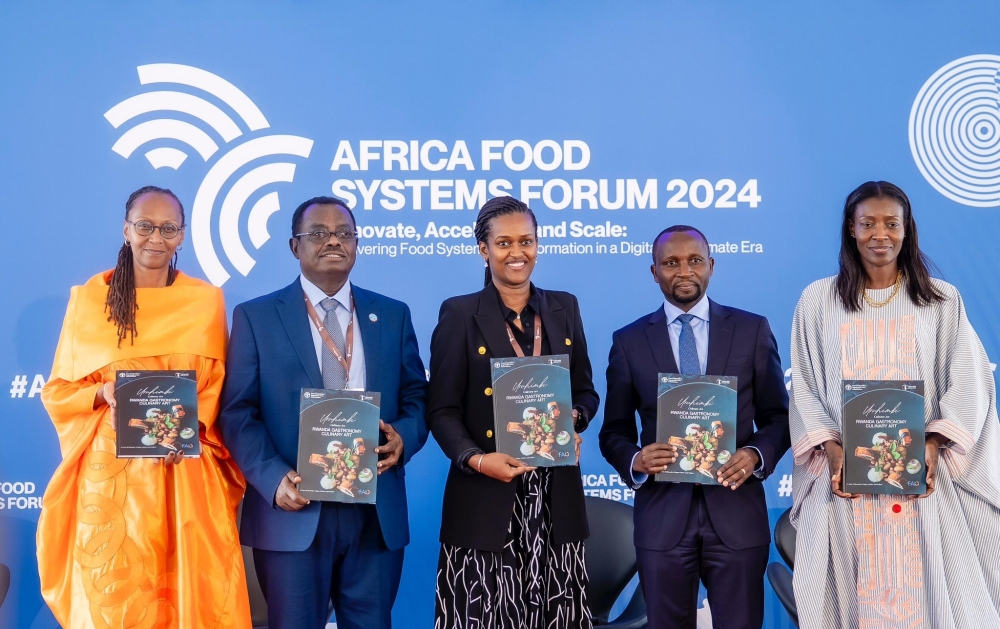 R-L: FAO Representative in Rwanda, Coumba Sow; the Minister of Agriculture and Animal Resources, Ildephonse Musafiri; the Minister of State for Youth and Arts, Sandrine Umutoni; FAO Assistant Director-General and Regional Representative for Africa Abebe Haile-Gabriel; and Sophie Kabano, Curator and Cultural Promoter at Rwanda Arts Initiative, launch Uruhimbi: Rwanda Gastronomy and Culinary Art, in Kigali, on September 4, 2024 (Photo by Jean Pierre Mazimpaka at MINAGRI).