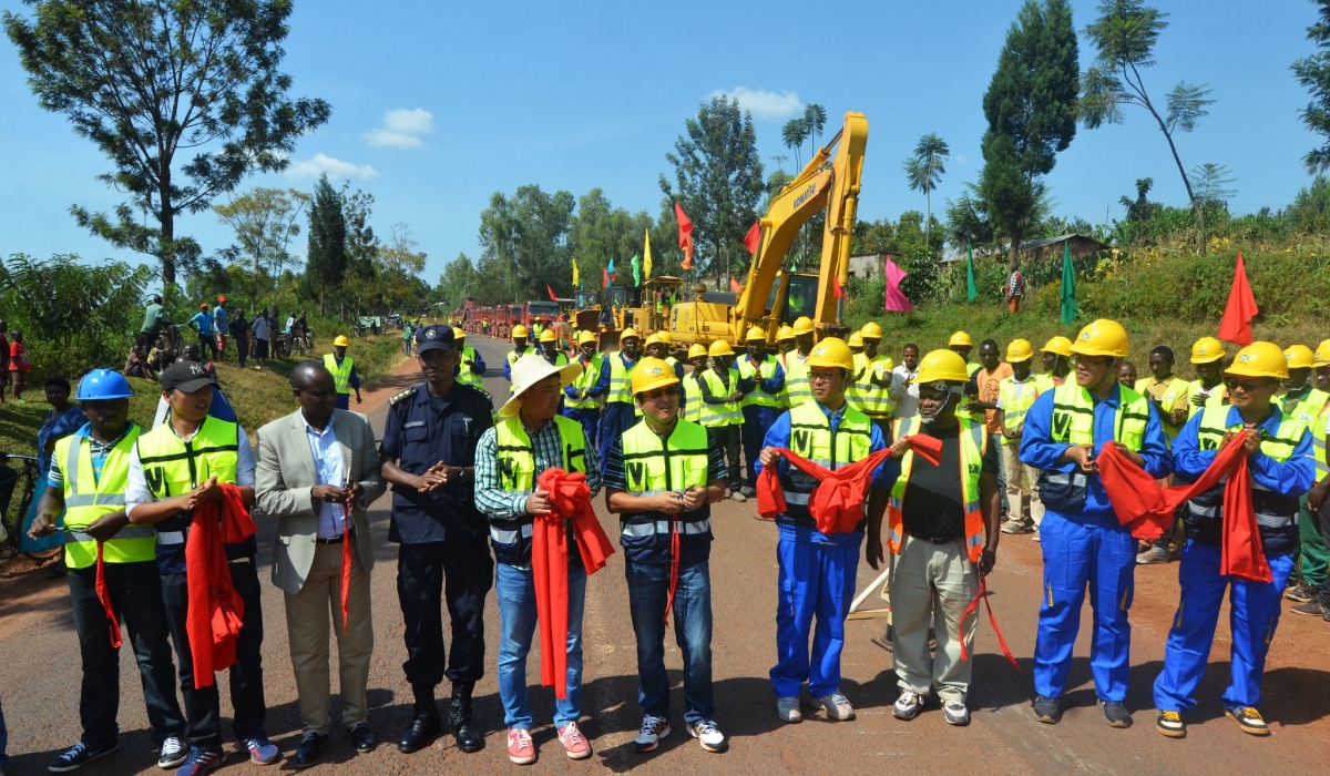 Officials and CRBC staff at the launch of the Kayonza-Rusumo rehabilitation and widening road project in 2016. File