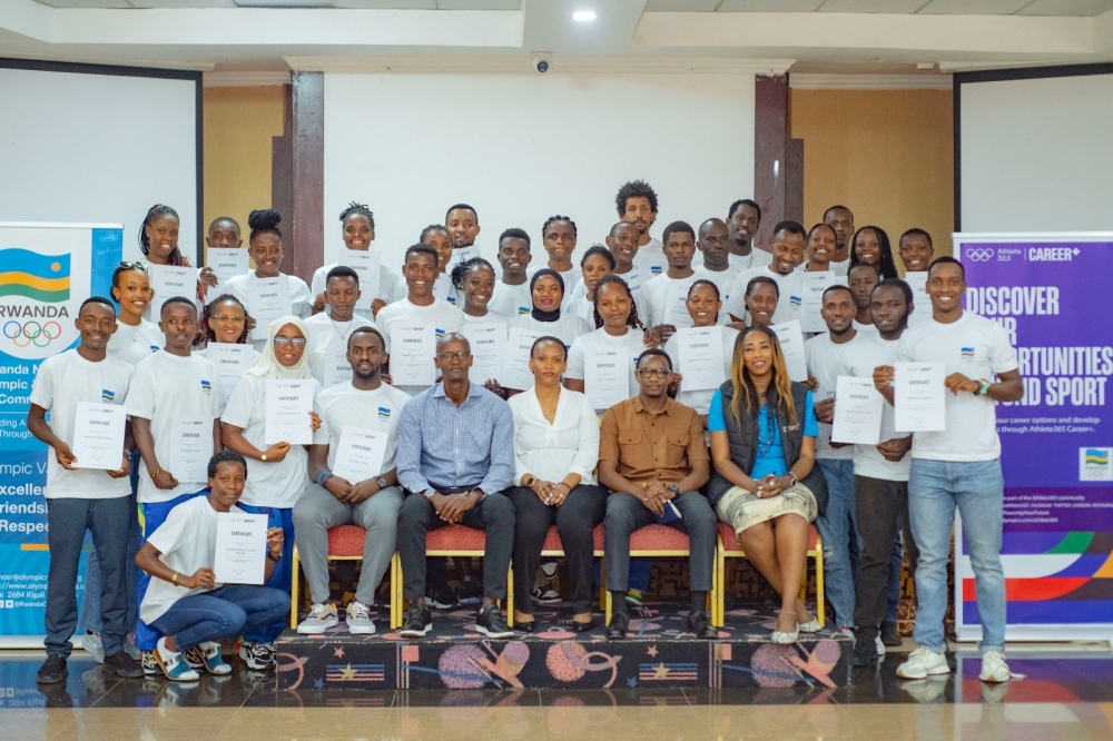 Athletes who turned up for the event pose for a picture with their instructors.