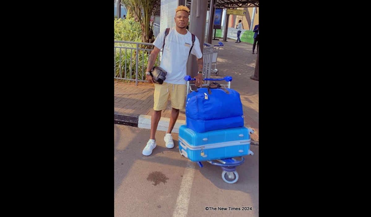 Nigerian midfielder Raphael Osaluwe at  Kigali International Airport on Friday, September 6 