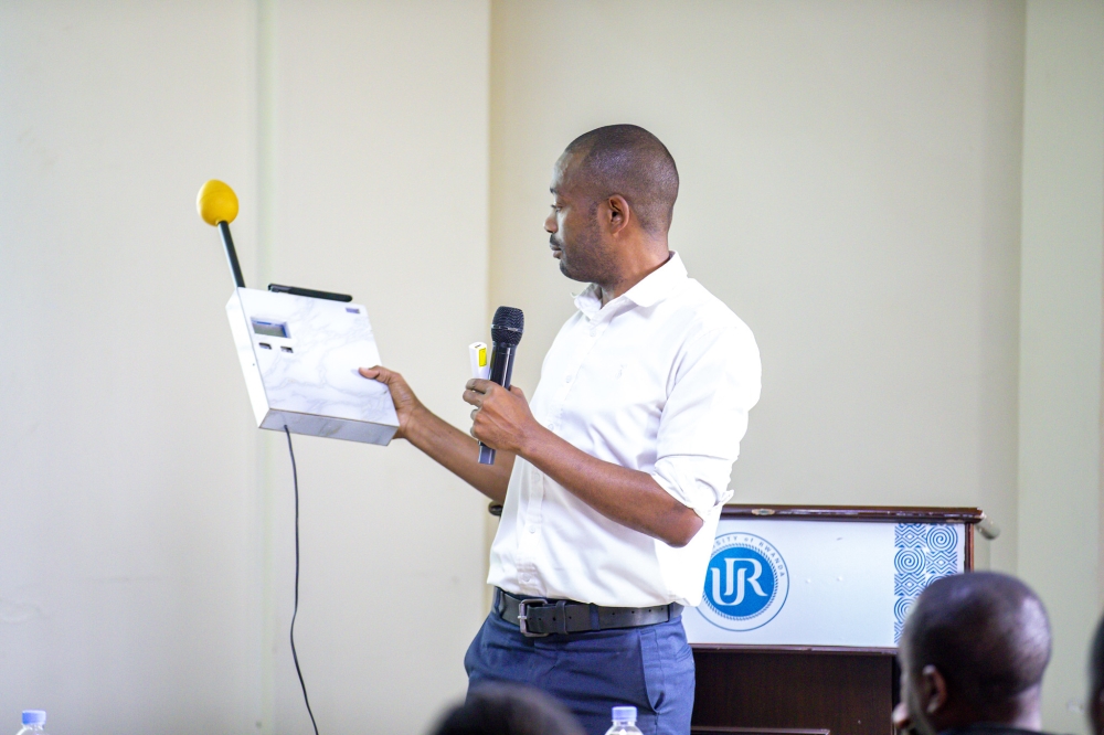 One of  the trainers showcases the newly unveiled  IoT-AI-based device for EMC monitoring, prediction during the workshop on Friday, on September 6. Photos by Emmaunel Dushimimana