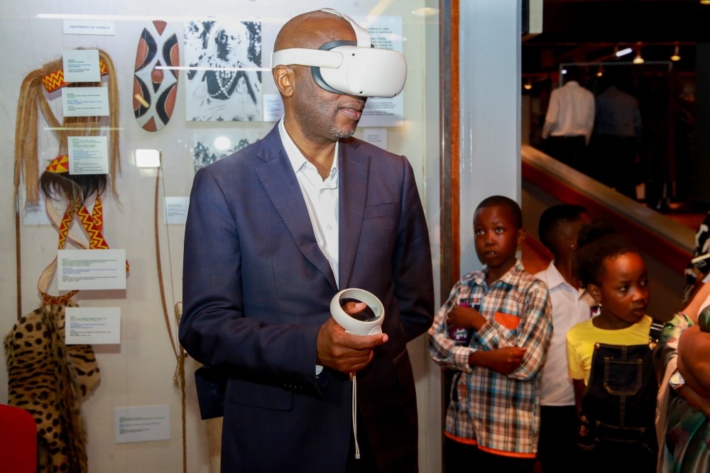 Robert Masozera, the Director General of the Rwanda Cultural Heritage Academy, tries out the VR headsets during the launch