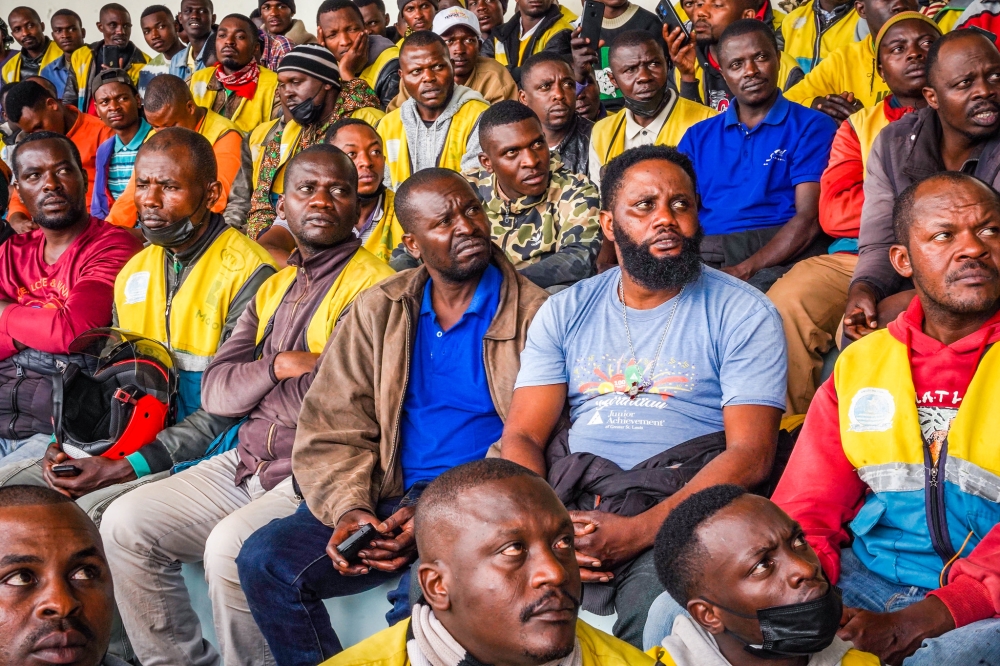 Taxi-moto riders during a general meeting with City of Kigali Officials at Kigali stadium. They have pointed out several challenges they face in their daily operations. Craish Bahizi