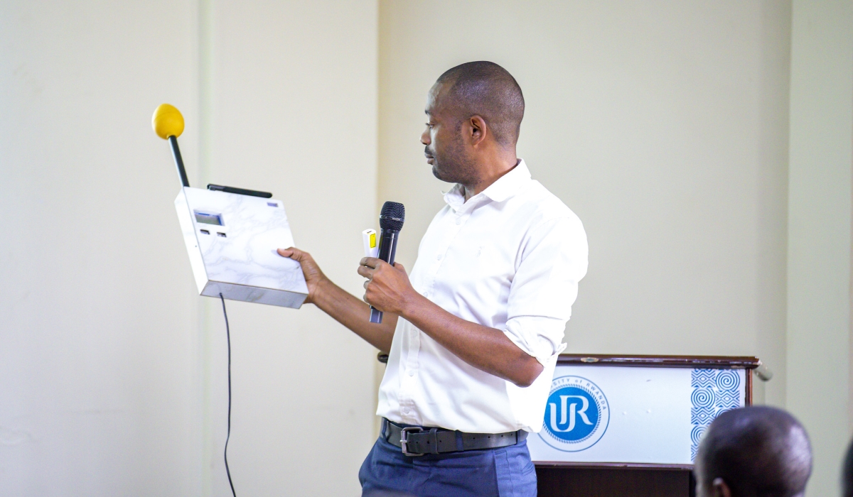 One of  the trainers showcases the newly unveiled  IoT-AI-based device for EMC monitoring, prediction during the workshop on Friday, on September 6. Photos by Emmaunel Dushimimana