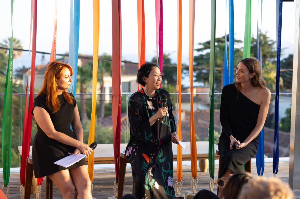 Annemarie Hou, Executive Director of the United Nations Office for Partnerships (C) speaks at the event.