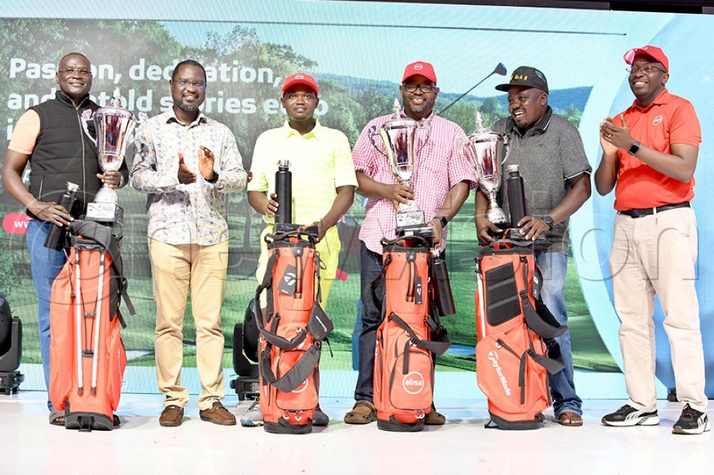 Rwandan golfer Celestine Nsanzuwera (3rd Left) emerged first runner-up in the 19th Johnnie Walker Uganda Professional Golf Open