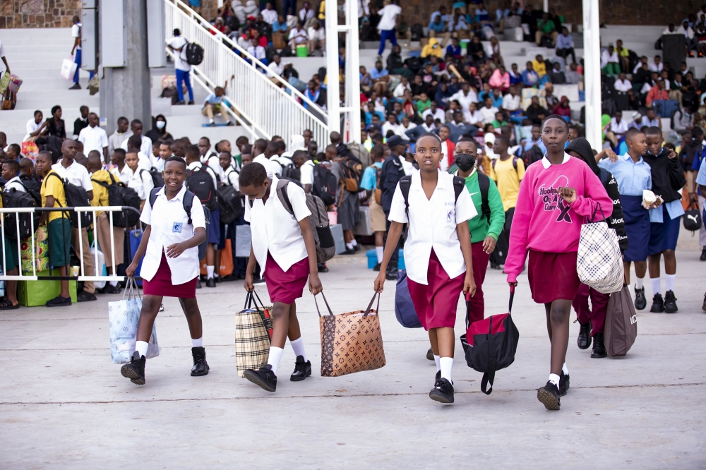 Students arrive at Kigali Pele Stadium to board buses to their respective schools across the country ahead of the 2024-2025 academic year that kicks off on Monday, September 9.  Emmanuel Dushimimana