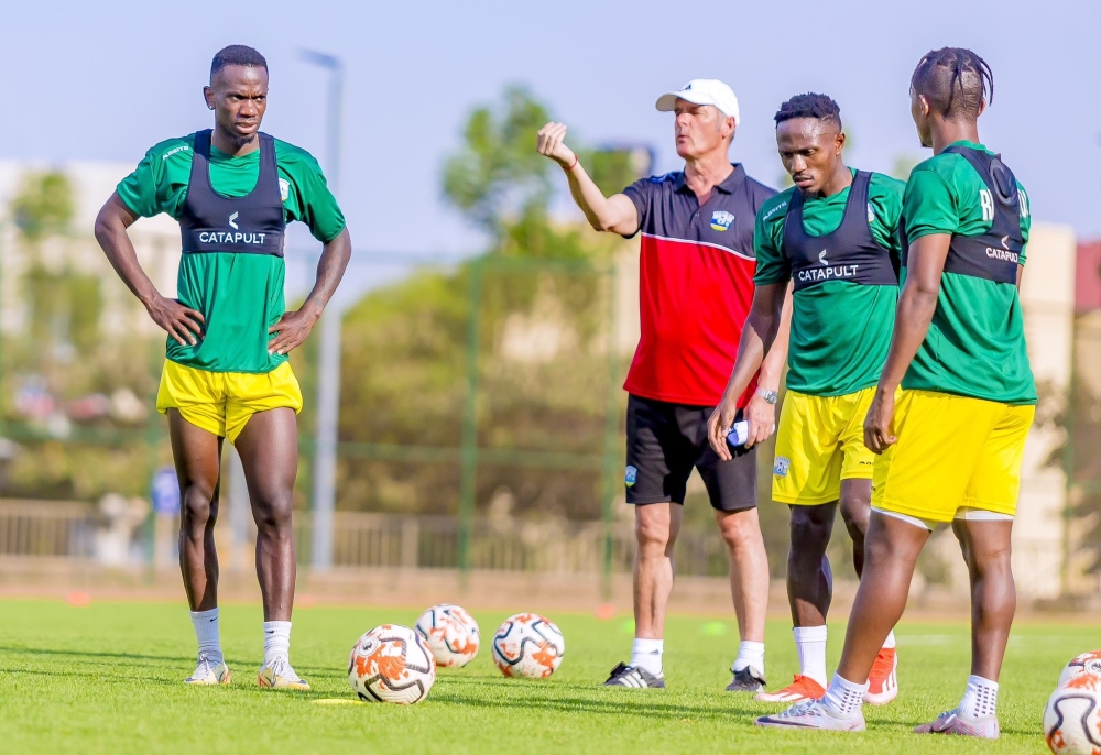 Rwanda head coach Torsten Frank Spittler gives instructions to the players during a training session ahead of the game against Nigeria on Tuesday. Courtesy