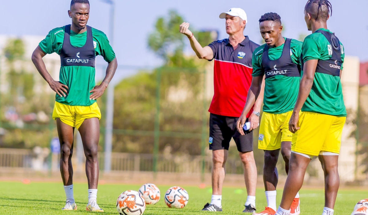 Rwanda head coach Torsten Frank Spittler gives instructions to the players during a training session ahead of the game against Nigeria on Tuesday. Courtesy