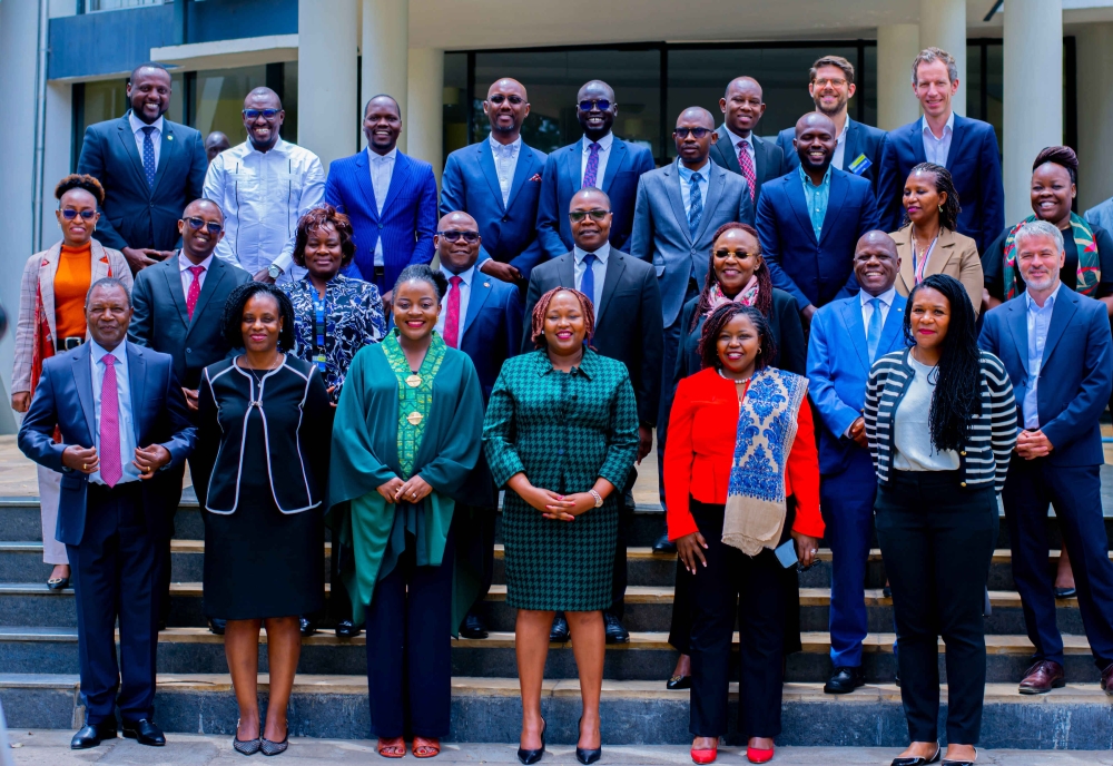 EAC Secretary General Veronica Nduva (3rd right) in a group photo with participants at the two-day roundtable discussion. In the front row are (from left) Prof Njuguna Ndung’u of the Bill and Melinda Gates Foundation, EAC Deputy Secretary General Annette Ssemuwemba, Dr Joy Maria Kategekwa of AfDB, Allen Asiimwe of TradeMark Africa, and Amani M’Bale of the Bill and Melinda Gates Foundation, on Wednesday, September 11. COURTESY OF EAC