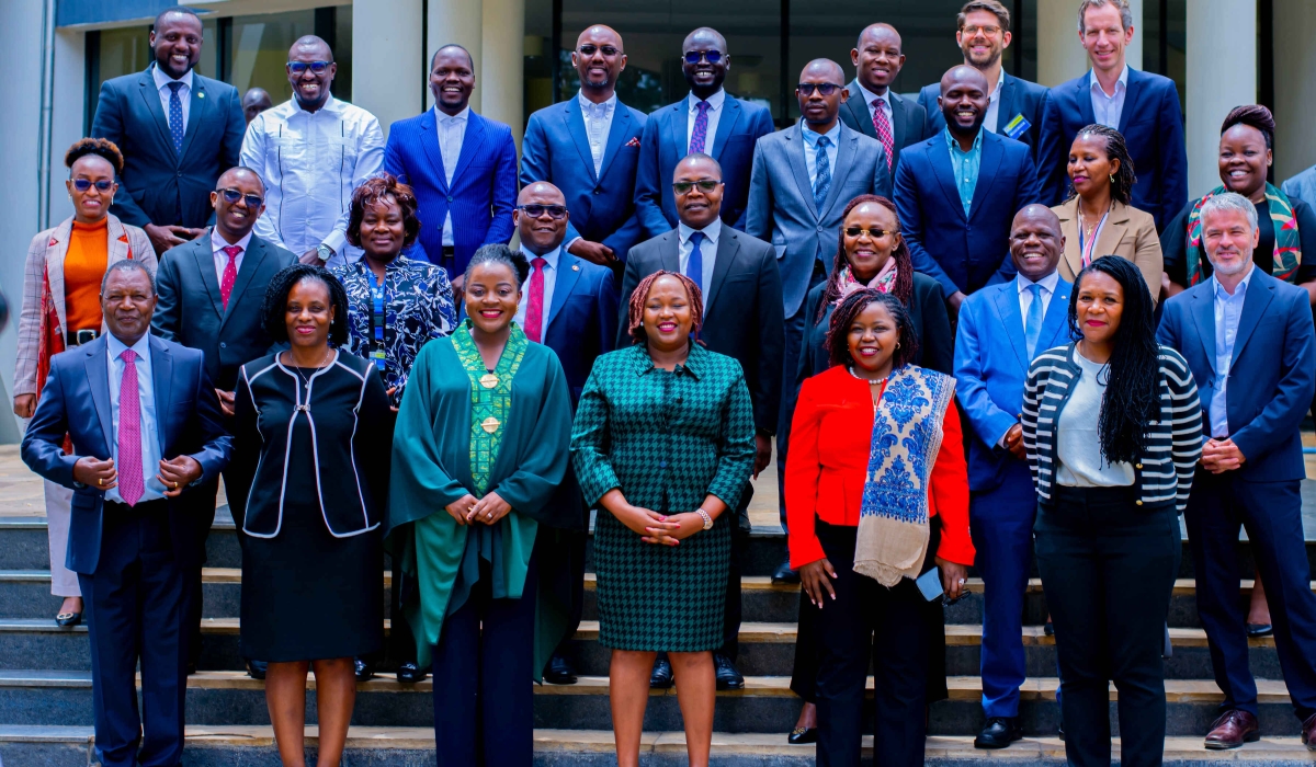 EAC Secretary General Veronica Nduva (3rd right) in a group photo with participants at the two-day roundtable discussion. In the front row are (from left) Prof Njuguna Ndung’u of the Bill and Melinda Gates Foundation, EAC Deputy Secretary General Annette Ssemuwemba, Dr Joy Maria Kategekwa of AfDB, Allen Asiimwe of TradeMark Africa, and Amani M’Bale of the Bill and Melinda Gates Foundation, on Wednesday, September 11. COURTESY OF EAC