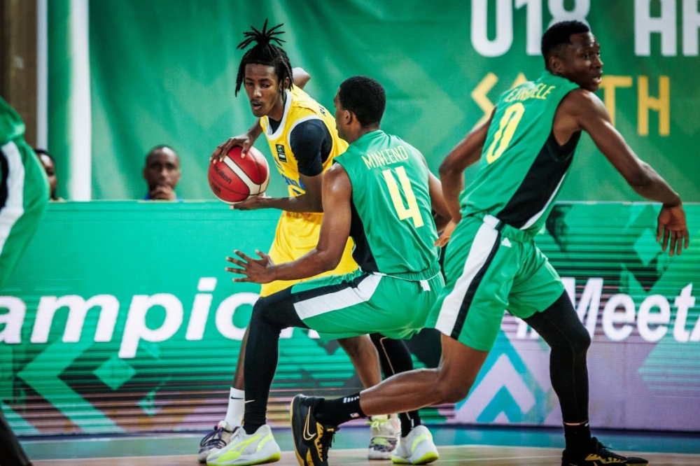 The U18 men&#039;s national team player with the ball during   the FIBA AfroBasket 2024  quarterfinal match against Cameroon. Courtesy