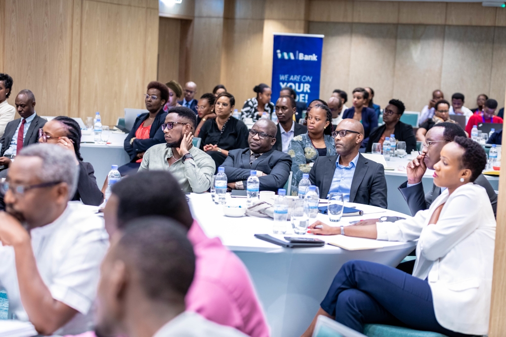 Participants follow a presentation during I&M Bank Rwanda&#039;s  Human Resource (HR) masterclass at the Kigali Marriott Hotel on Thursday, September12. Photos by Craish BAHIZI