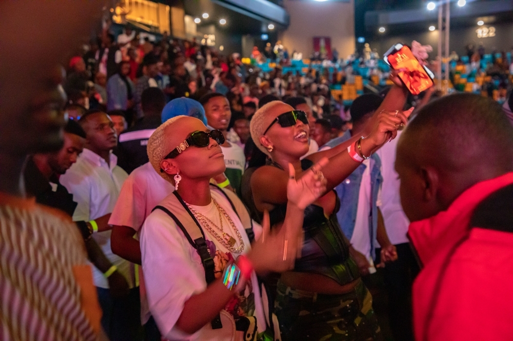 Revelers dance as Ariel Uwayezu, commonly known as Ariel Wayz performs at BK Arena on January 1, 2023.