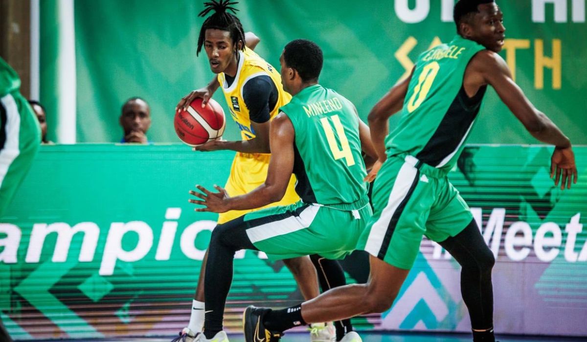 The U18 men&#039;s national team player with the ball during   the FIBA AfroBasket 2024  quarterfinal match against Cameroon. Courtesy