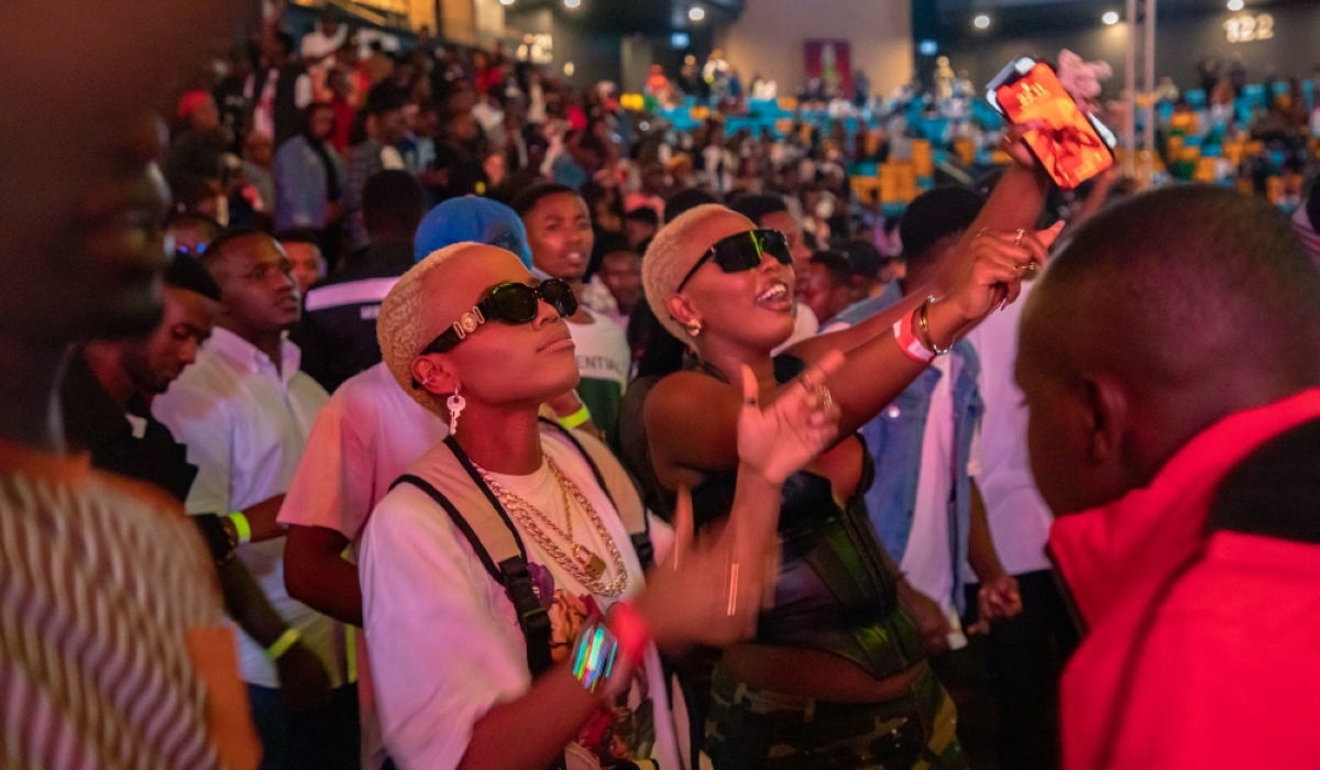 Revelers dance as Ariel Uwayezu, commonly known as Ariel Wayz performs at BK Arena on January 1, 2023.