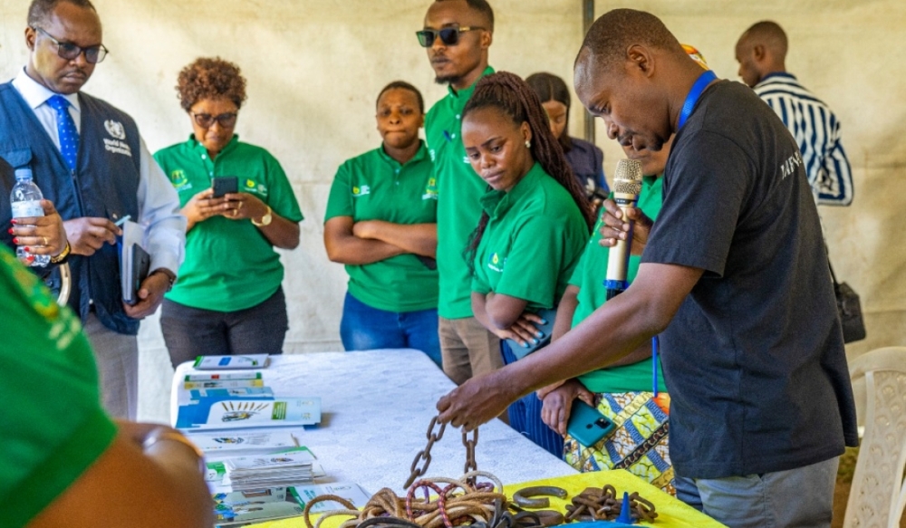 Participants at Mental health awareness compaign visit a mini exhibition to see some of tools that the society had been using while dealing with a mental health victim in Rubavu. Courtesy