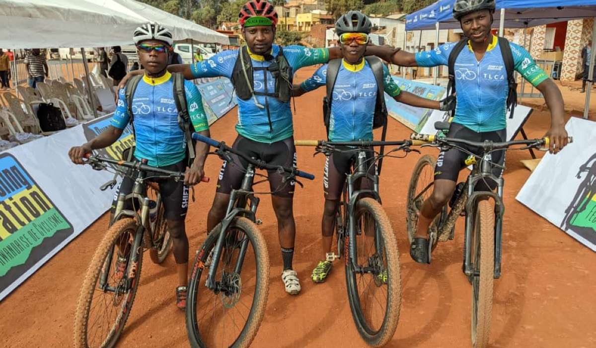 Florent Nsengumuremyi(2nd L), the founder of Twin Lakes Cycling Academy and the academy&#039;s young cyclists during a past youth race competition-courtesy