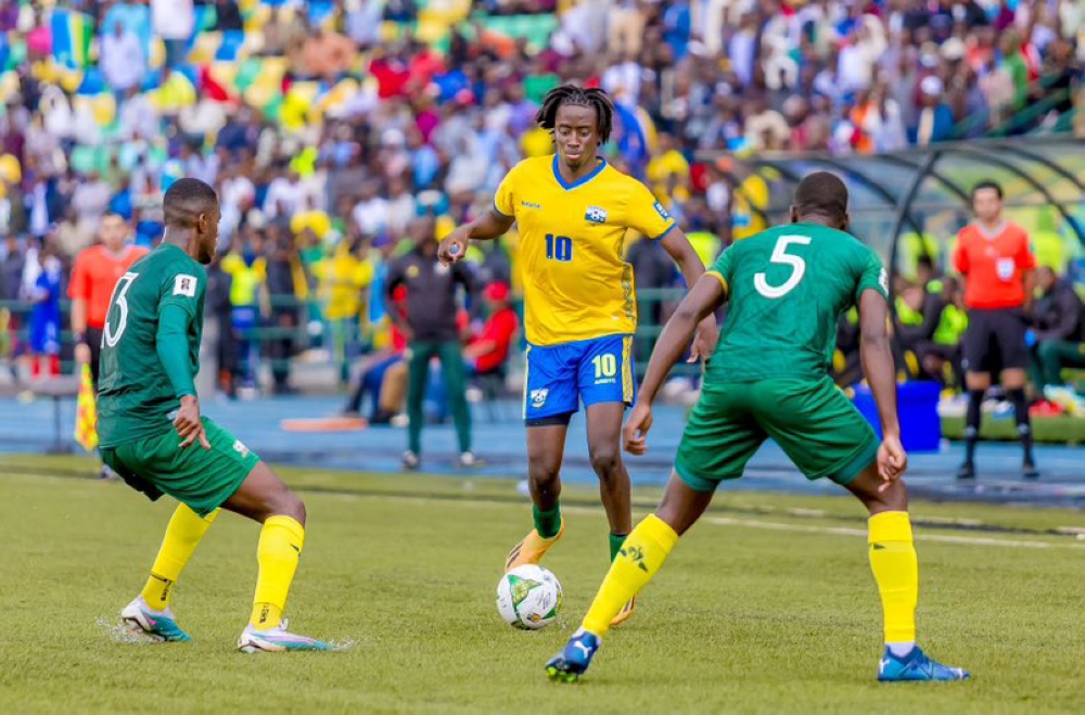 Amavubi attacking midifilder Hakim Sahabo tries to go past a South African defender during a Wold Cup qualifier game at Huye Stadium on November 21, 2023. Photo: Courtesy.