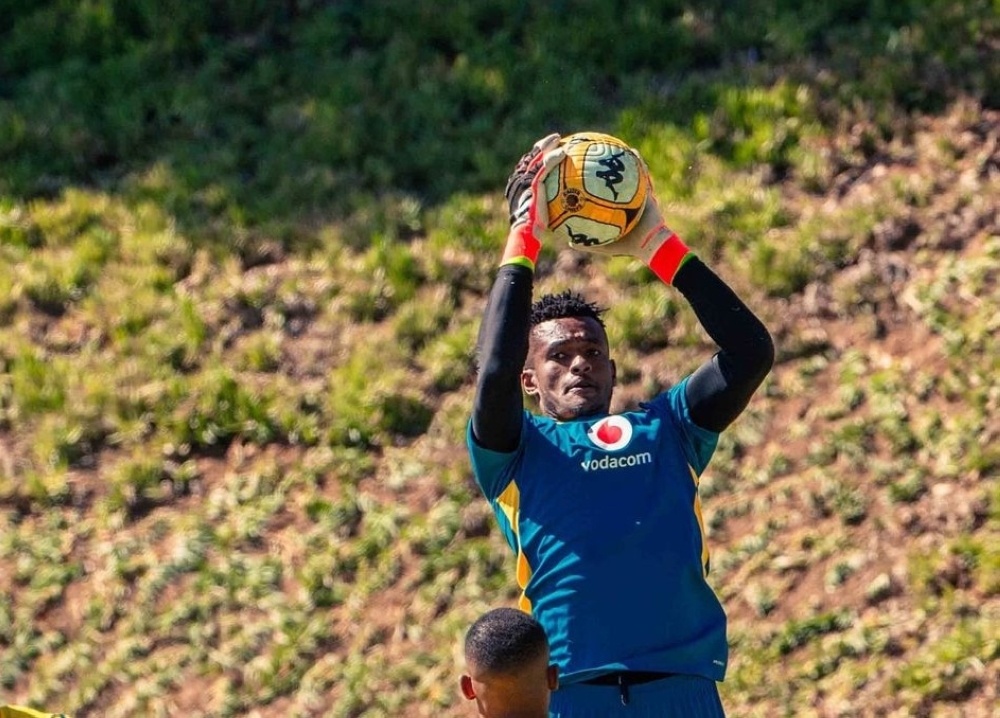 Goalkeeper Fiacre Ntwari in action during a training session.