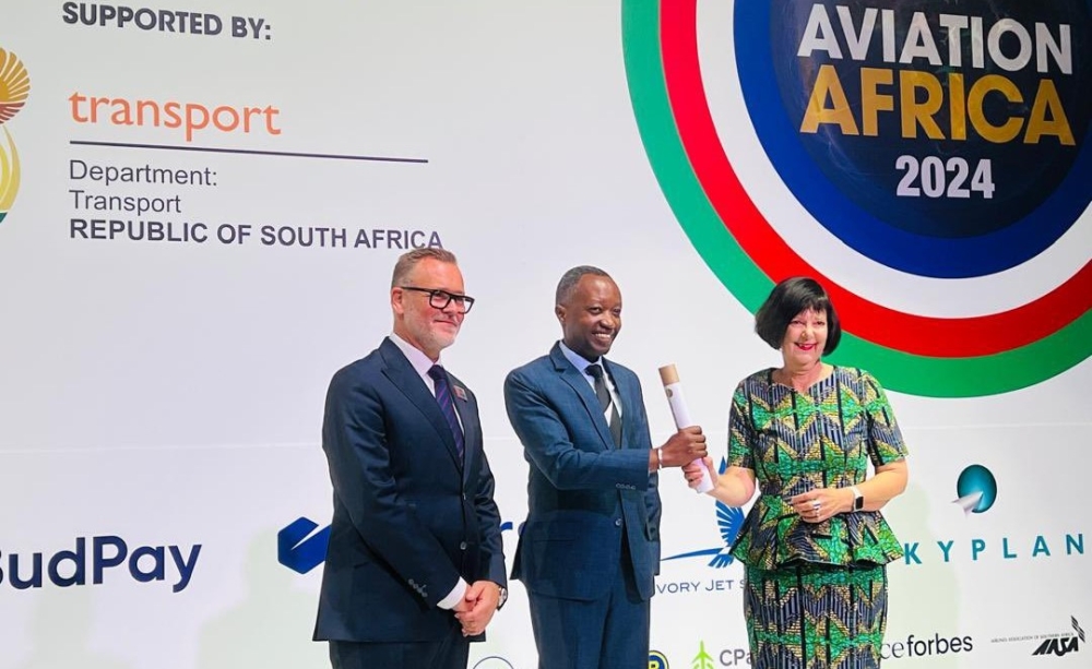  State Minister in the Ministry of Infrastructure Olivier Kabera (c) and other officials during the 2024 Aviation Africa Summit in Gauteng, South Africa on Monday, September 16.  Rwanda was announced as the host of the Aviation Africa Summit and Exhibition 2025. Courtesy