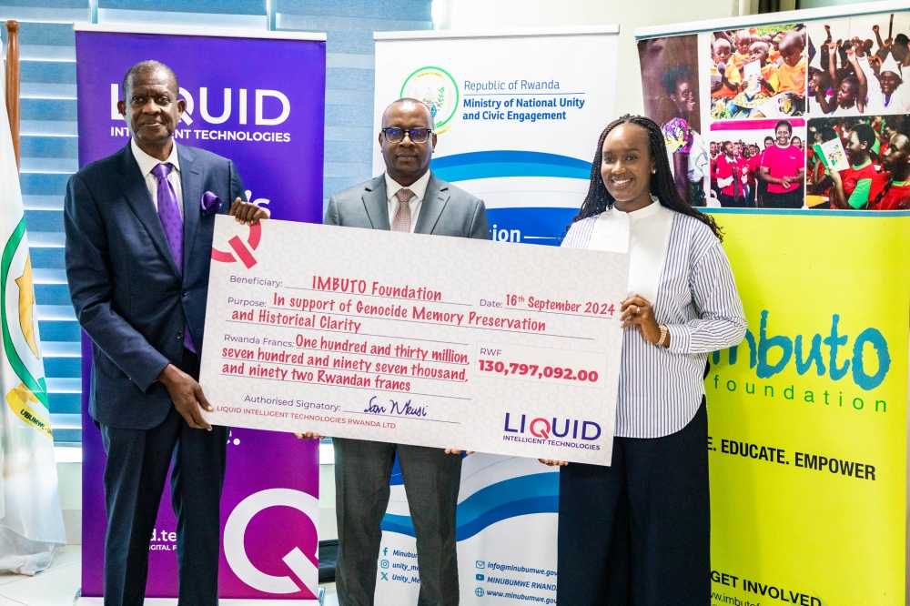 (L-R) Sam Nkusi, Executive Chairman of Liquid Intelligent Technologies Rwanda, Minister Jean-Damascène Bizimana and Elodie Shami, Director-General of the Imbuto Foundation during the handover of the donation in Kigali on Monday, September 16. ALL PHOTOS BY CRAISH BAHIZI