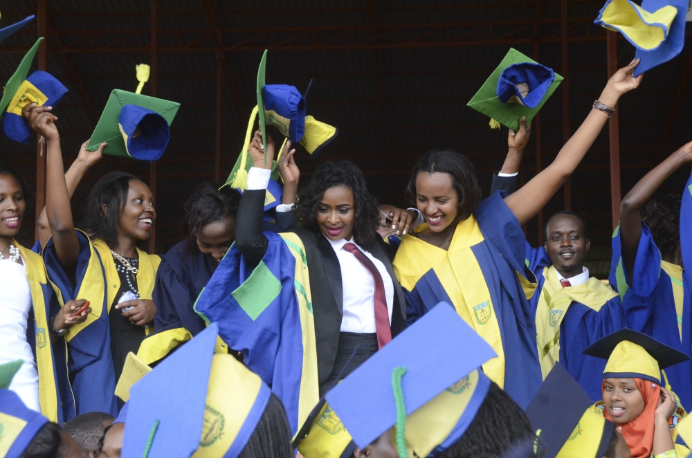 Graduates celebrate during the graduation ceremony at ULK.  Craish Bahizi