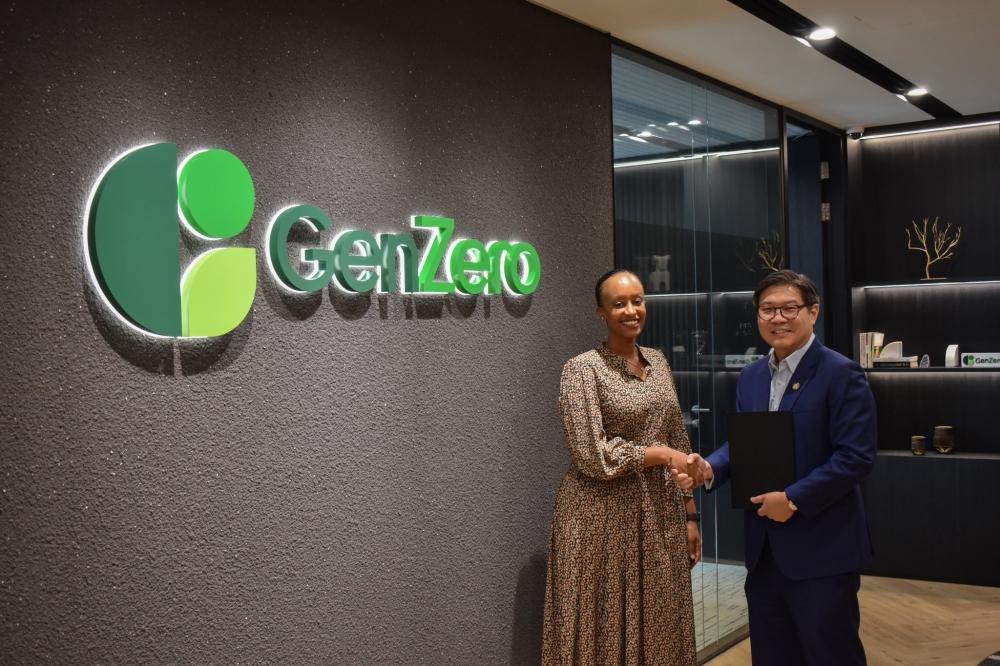 Teddy Mugabo, chief executive at Rwanda Green Fund and Frederick Teo, chief executive at GenZero during the signing ceremony on Thursday, September 19. Courtesy