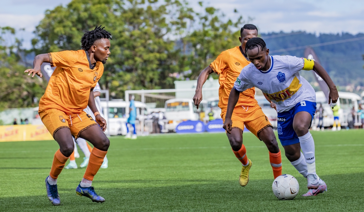 Rayons Sports captain Kevin Muhire tries to go past Bugesera FC defenders during the Peace Cup. The Blues will face Gasogi United in do or die clash on Saturday at Amahoro Stadium. Photo by Emmanuel Dushimimana