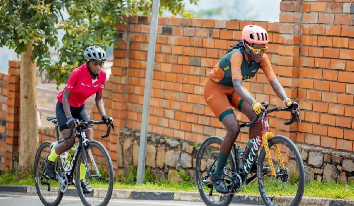 Xaverine Nirere and Jazilla Mwamikazi ride in Kigali during Rwanda Cycling Cup. The two cyclists are among the riders selected to represent Rwanda in Zurich. Courtesy