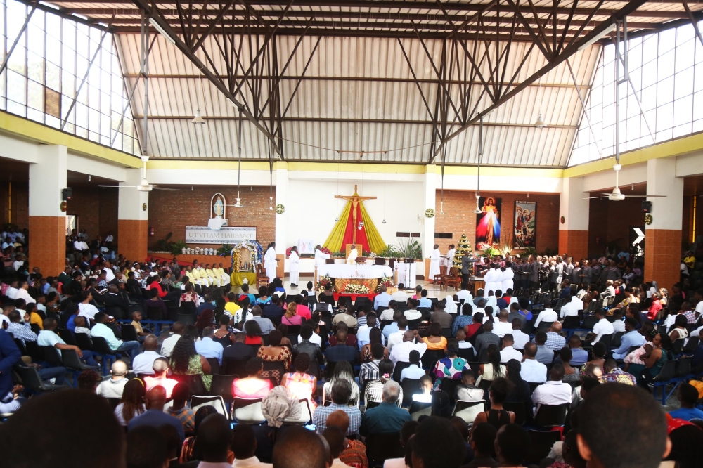 Catholic church believers during a holy communion mass at St Michel in Kigali. Photoo by Craish Bahizi