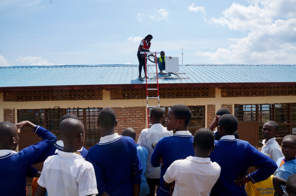 Technicians install Starlink internet at a school in Rwanda. In mid 2023, Rwanda launched Starlink internet in 50 schools countrywide.